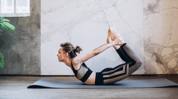bow pose. Increases agility and flexibility