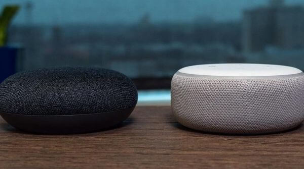 Black Mini speaker vs White Dot speaker kept near each other to give the people an exact idea about their designs.