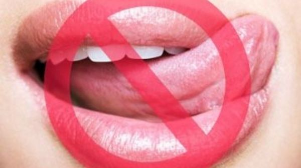 Repeated licking of lips will darken the portion & bits will cause cracks. So avoid licking to get pink lips.