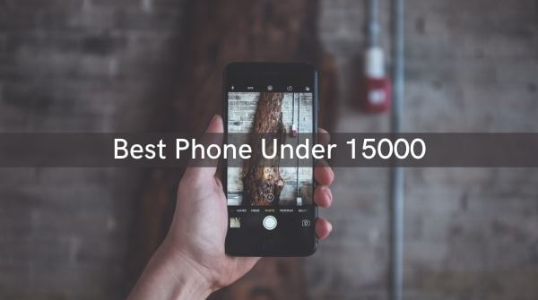 Man holding phone in hand with the camera on