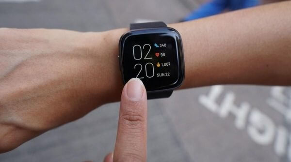 Fitbit Versa 2 with black color synthetic strap